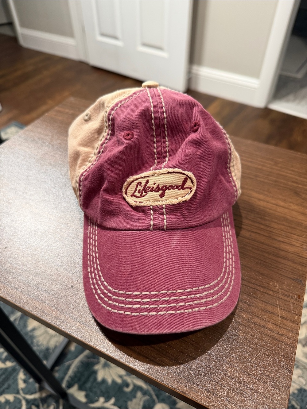 Life Is Good burgundy and tan two-tone cap with embroidered logo